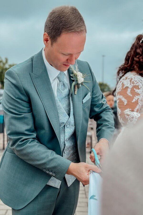 Herren 31 Real Bräutigam in grünem Anzug